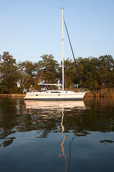 Catalina 355 motoring, as seen from starboard side