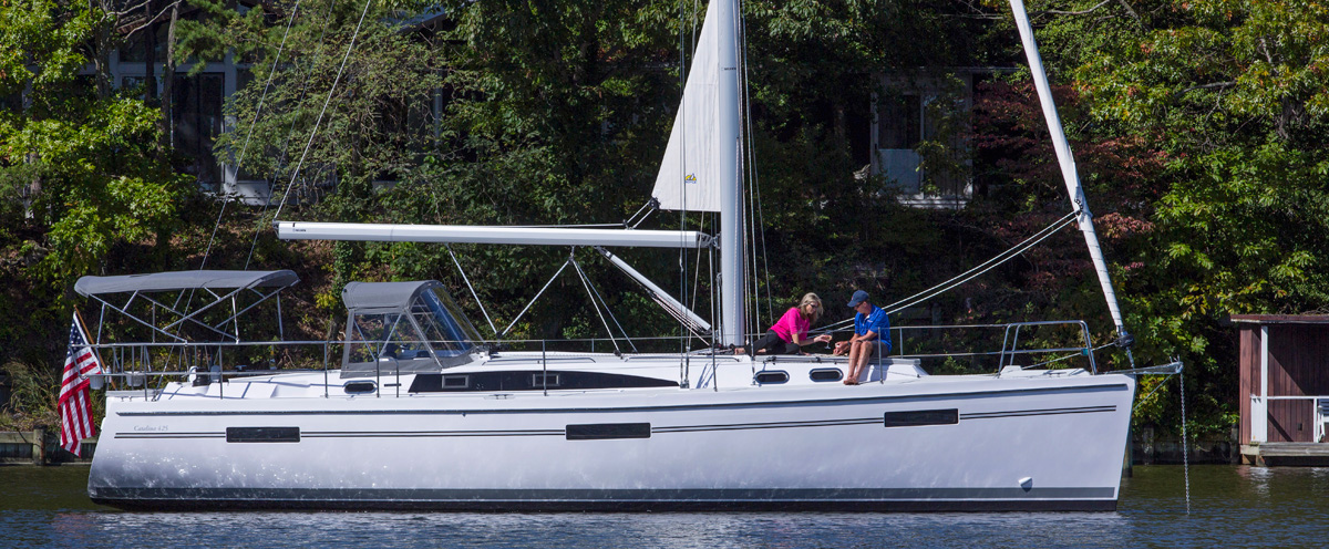 Catalina 425 owners enjoying time on deck while boat is anchored